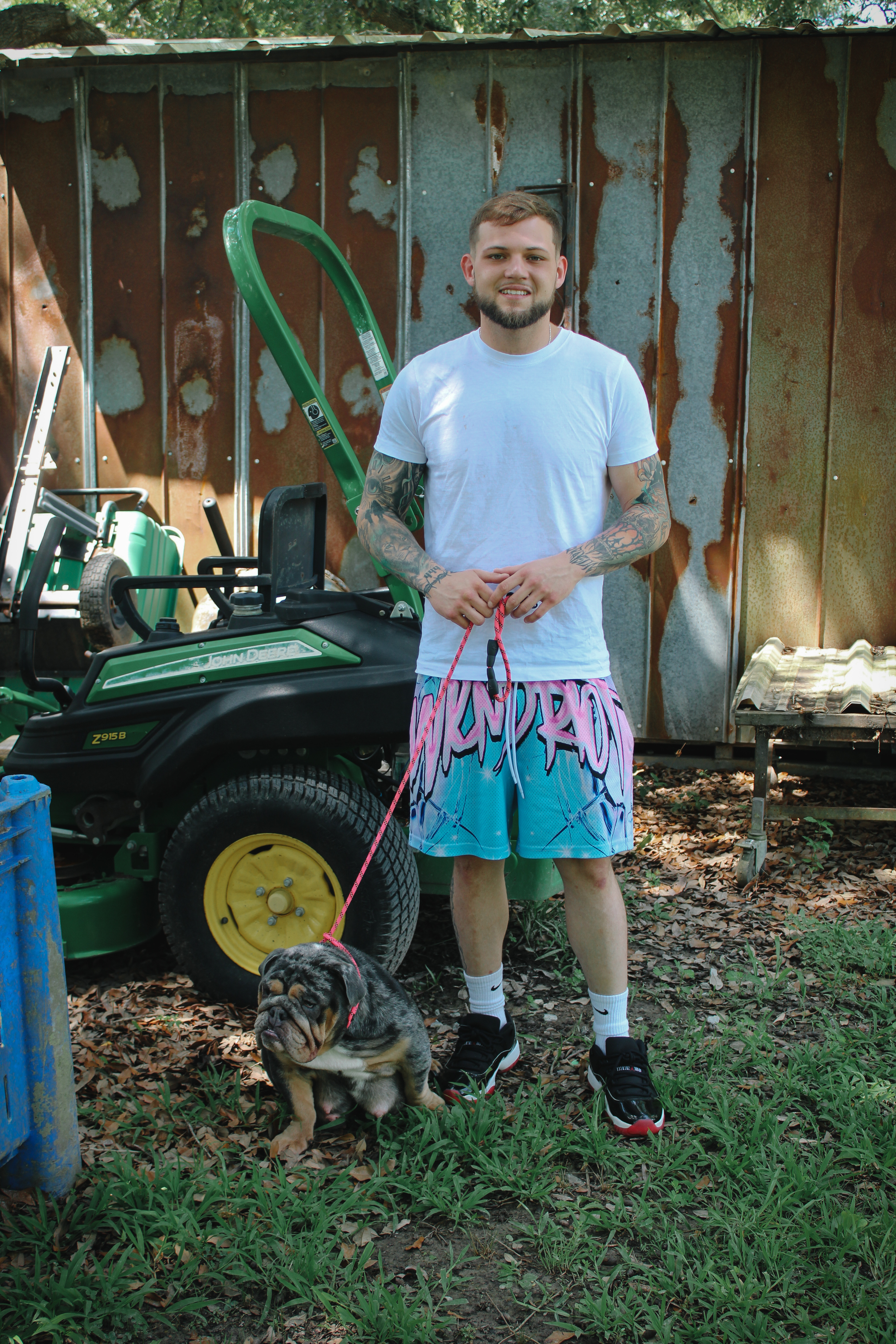 Logan - GodSpeed Bulldogs Breeder with his puppy